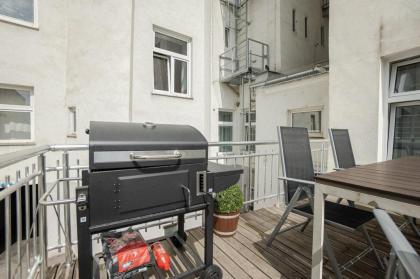 Sunny apartment in Leopoldstad terrace with grill - image 5